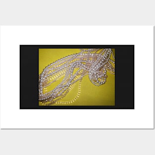 Pink pearls and beads on a deep yellow background Posters and Art